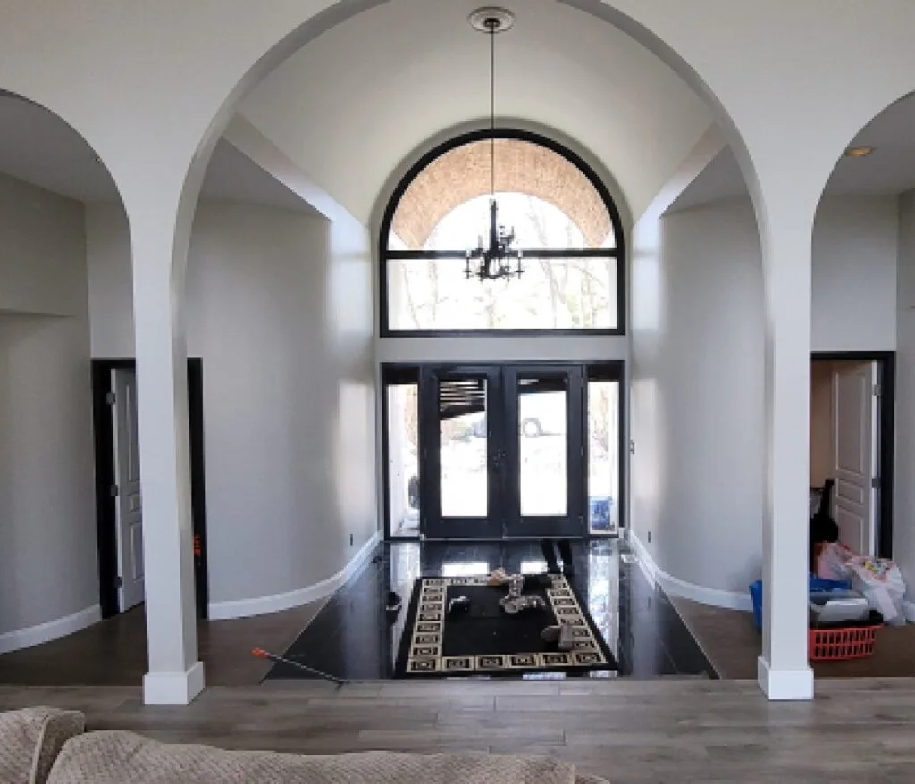 Foyer with arches after a complete interior repaint